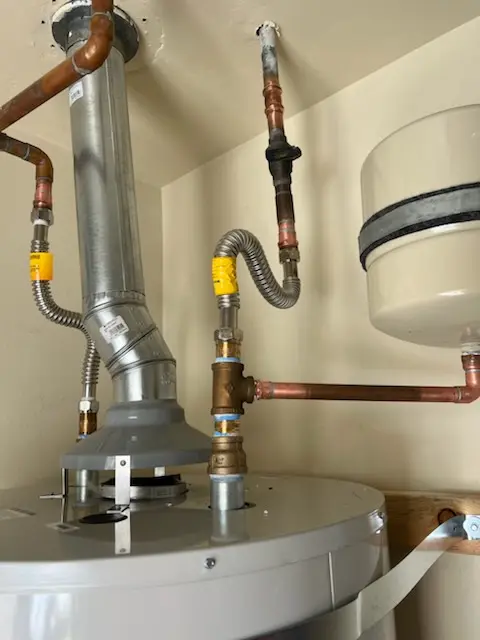 Water heater installation and plumbing repair in Kensington